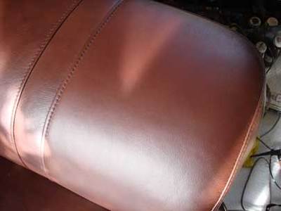 Brown, leather sofa arm after Sofa Tech restoration