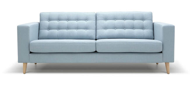 Light blue, fabric sofa with white background