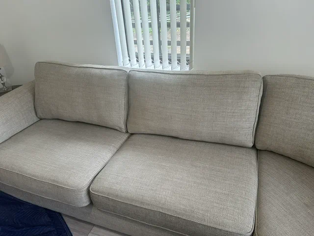 Sofa back cushions restored to a fuller shape after foam replacement